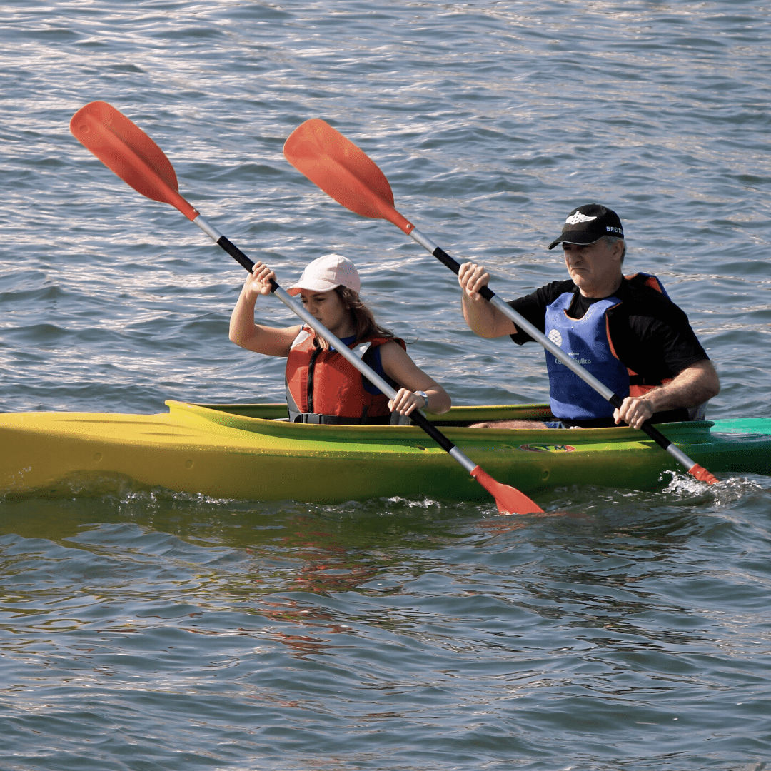 Two participants kayaking on an iConnect Life outdoor group outing